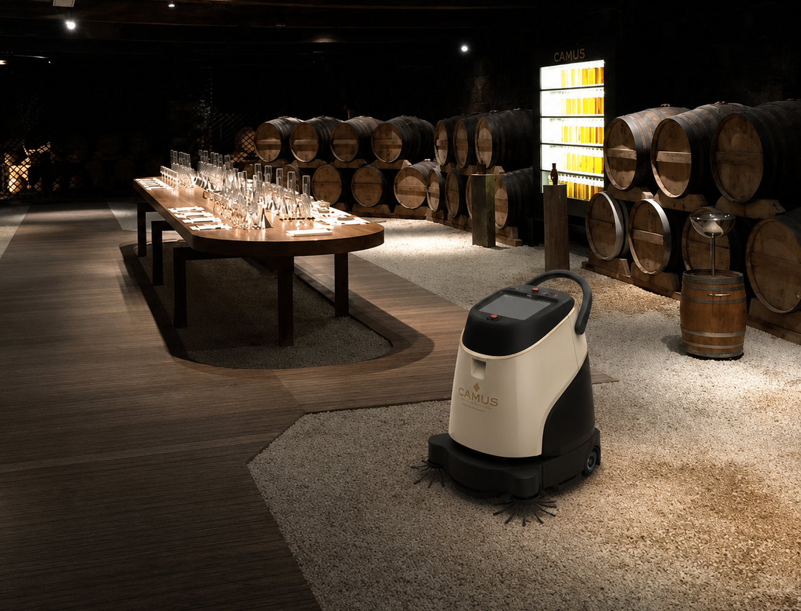 Camus branded reception robot in champagne gold